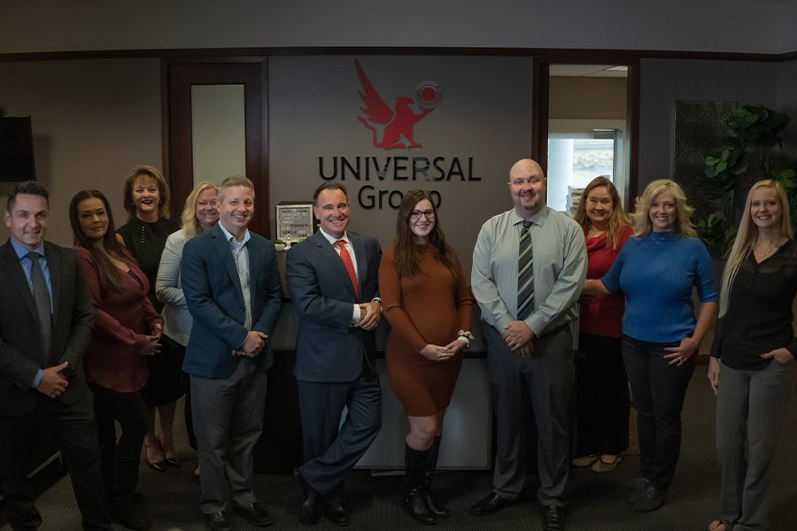 Omaha, NE Insurance - Team at Universal Group LTD Portrait in the Office